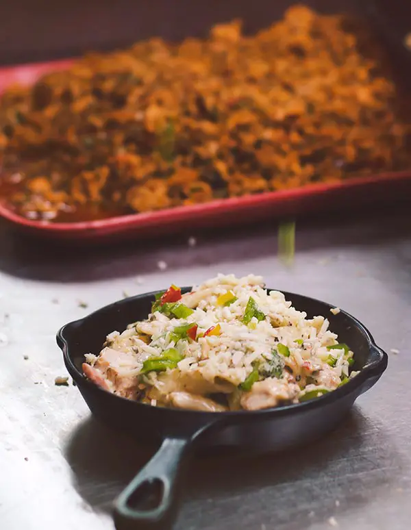 selective focus photo of skillet filled with food